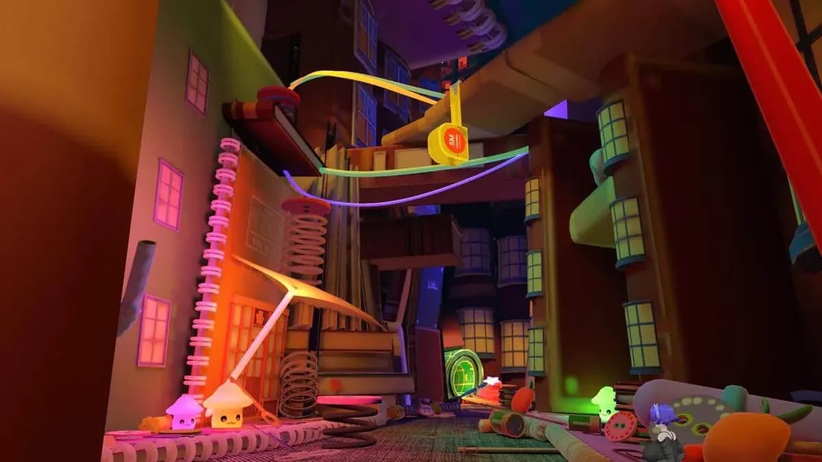 Inside the world at floor level. Books stacked like buildings with lit windows, giant springs, a tape measure, and small glowing mushroom lamps.