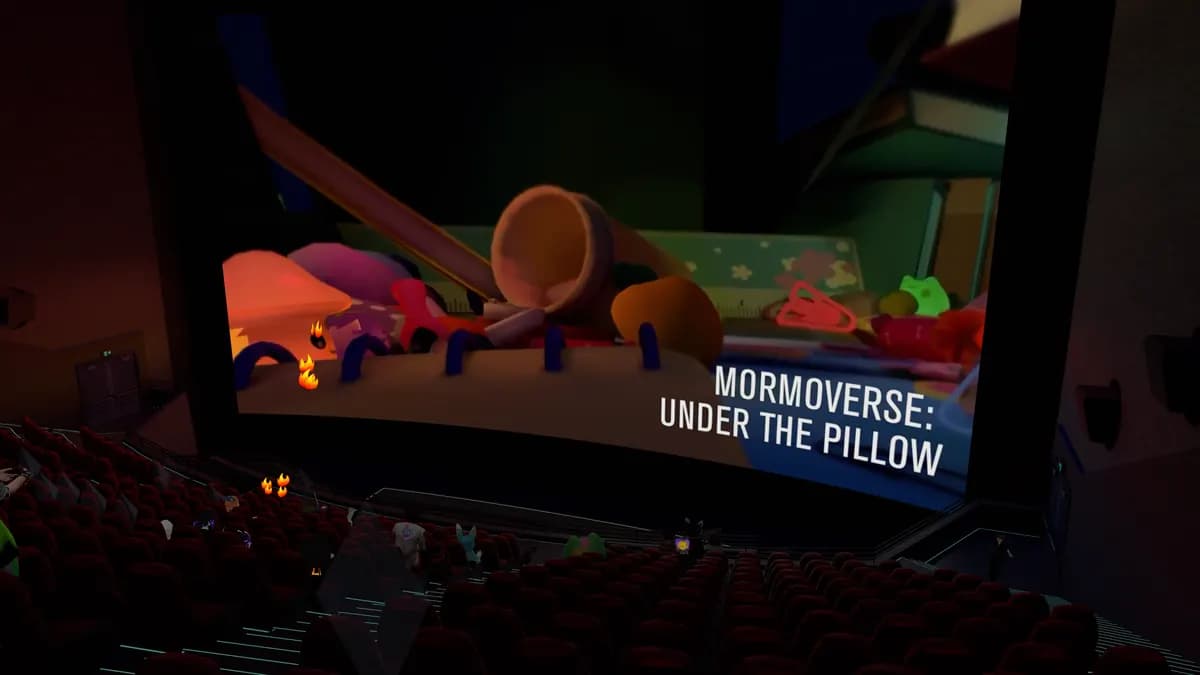 A virtual cinema. Avatars sit in the seats. The screen reads Mormoverse: Under the Pillow.