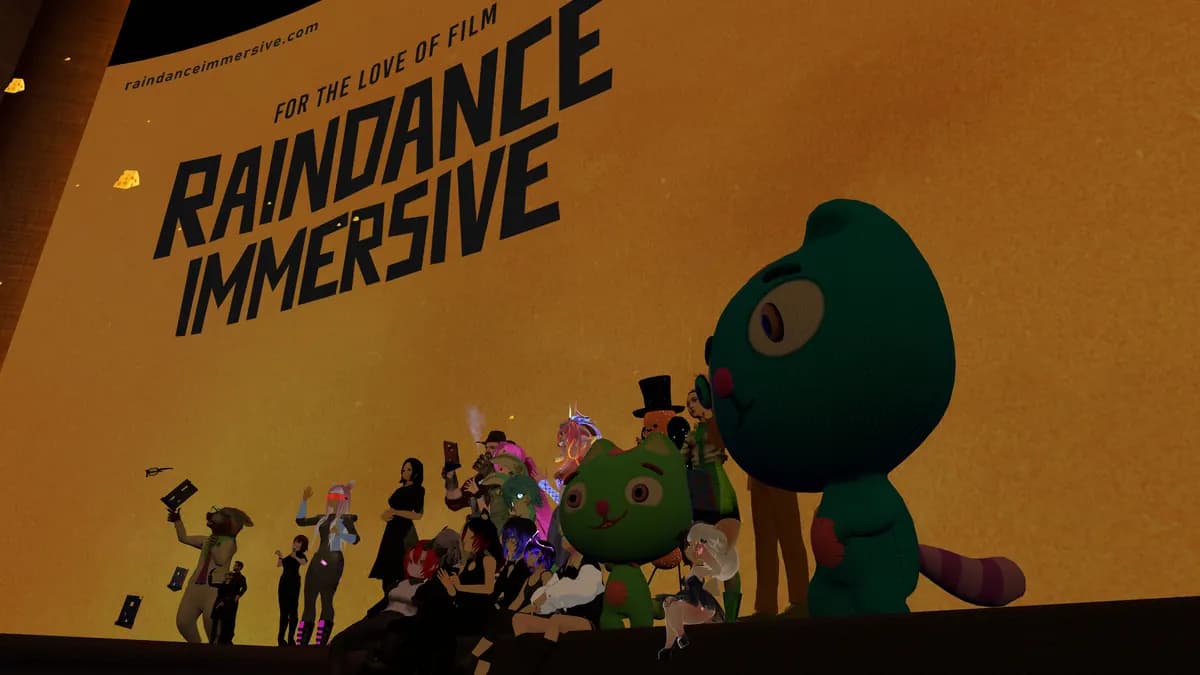 Avatars crowd a stage under a Raindance Immersive banner, next to a large knitted green cat.