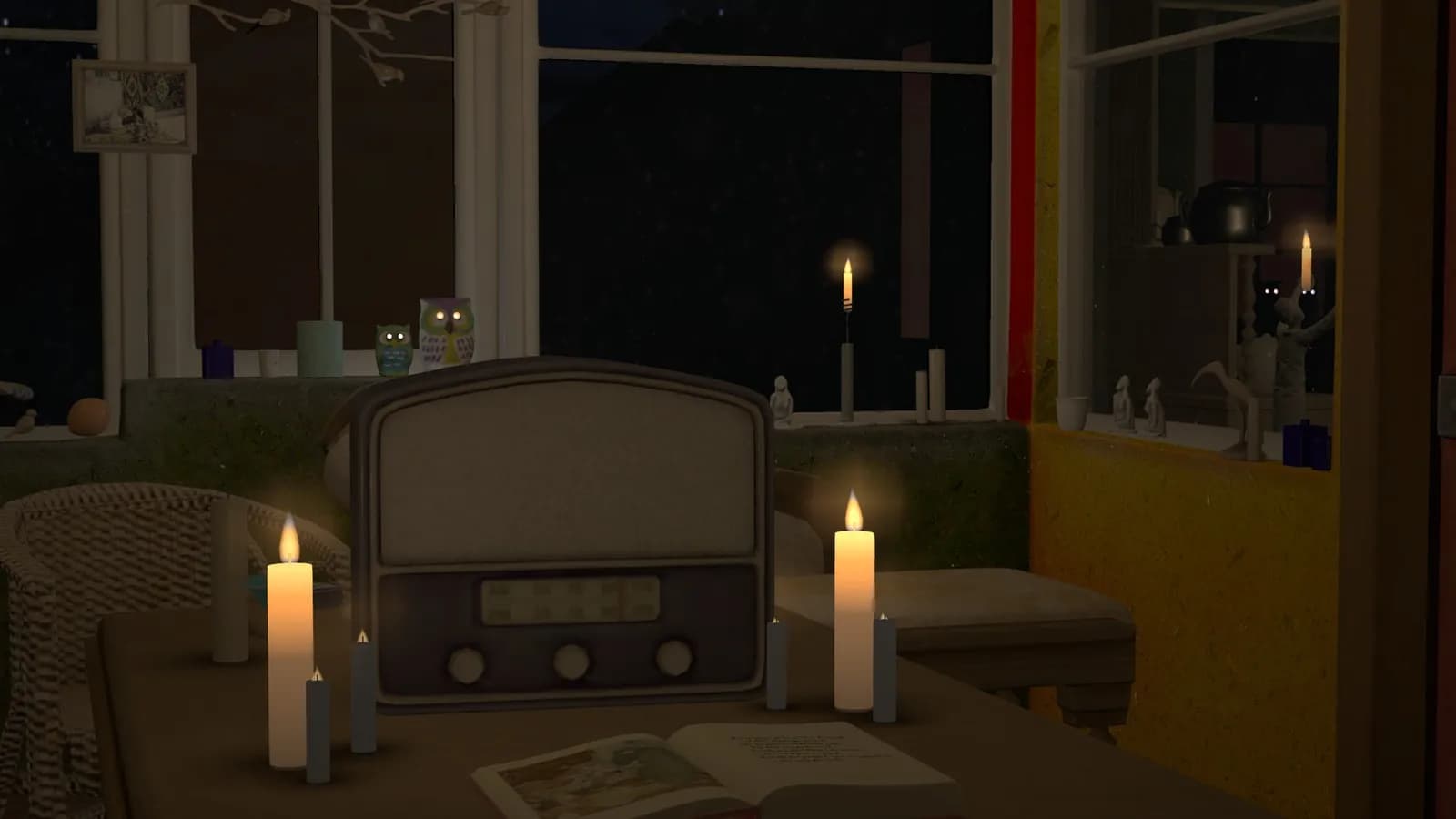 An open book on the sitting-room table, candles lit, the night window beyond